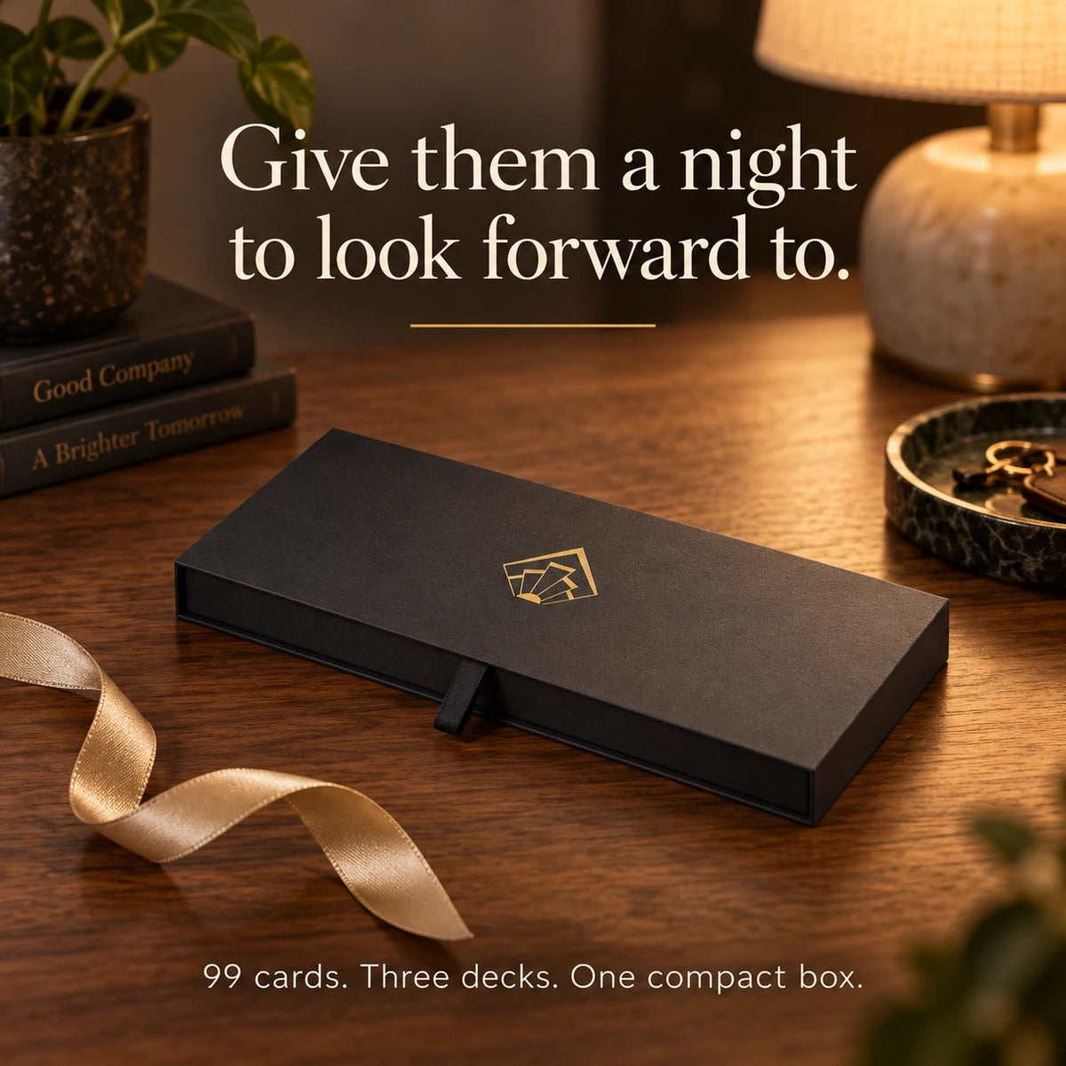 Give them a night to look forward to. 99 cards. Three decks. One compact box. The slim black Cards box styled as a gift.